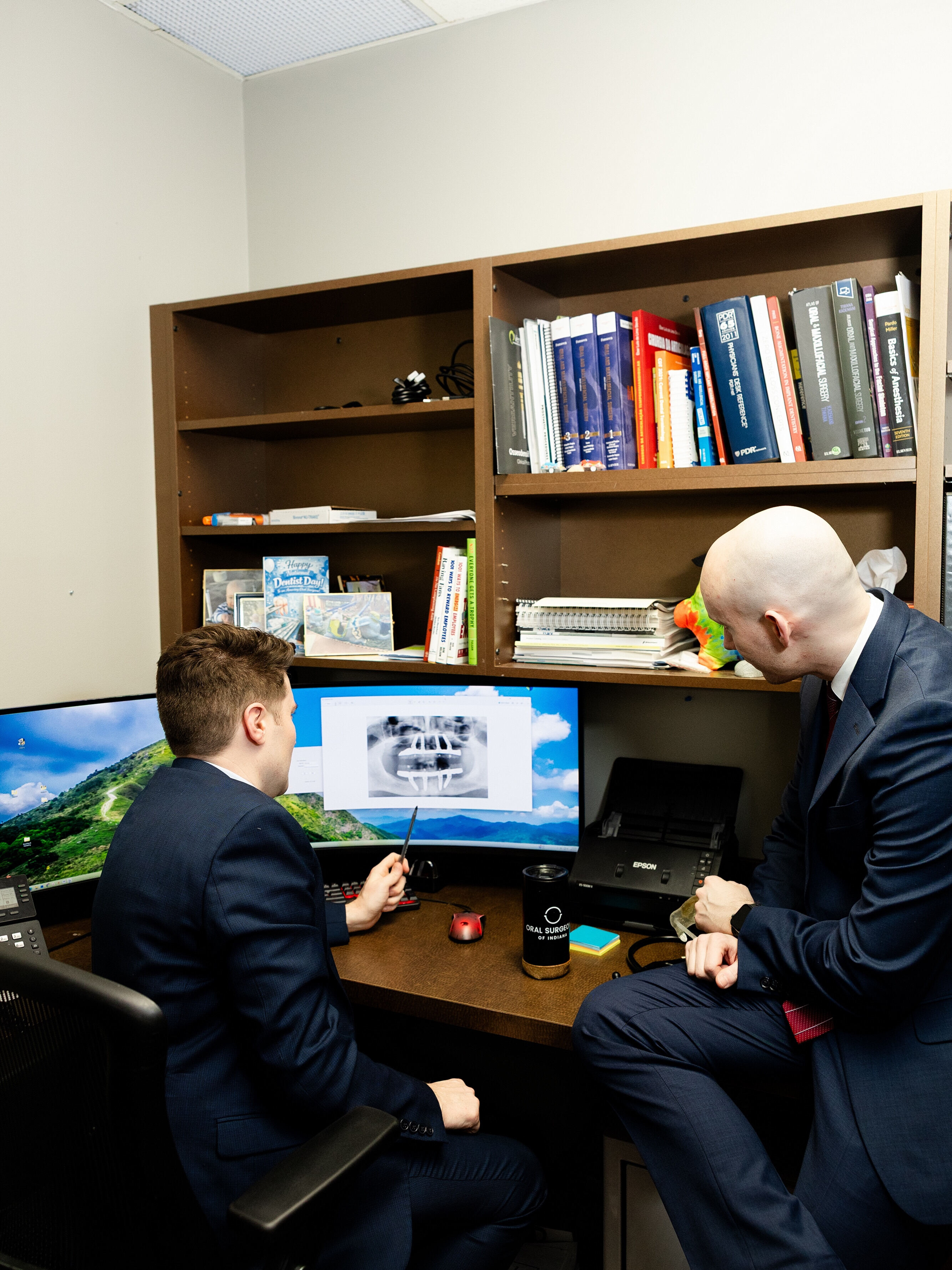 Our surgical team consulting with a patient